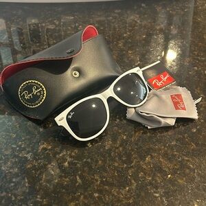 Women’s white and brown Ray Ban sunglasses